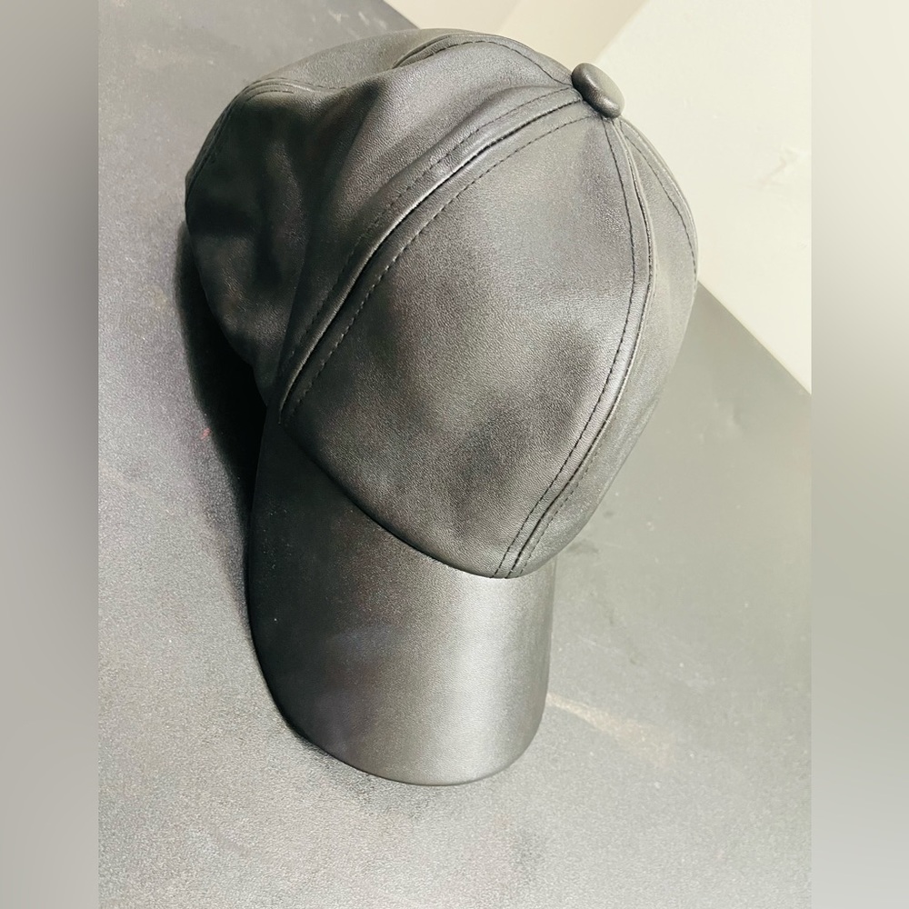 Leather imitation cap ,never use.